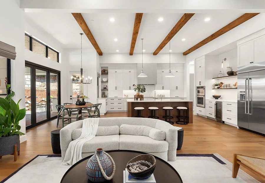 An open-plan apartment with a wall-mounted split unit